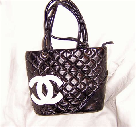 black chanel purse with white logo|classic black chanel purse.